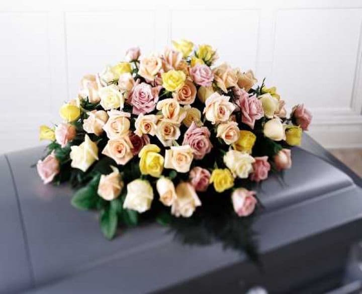 The Peaceful Tribute Casket Spray